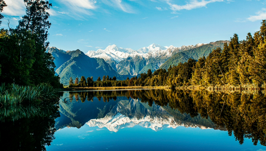 Reflections of Mount Cook and Mount Tasman in Lake Matheson, Fox Glacier, New Zealand