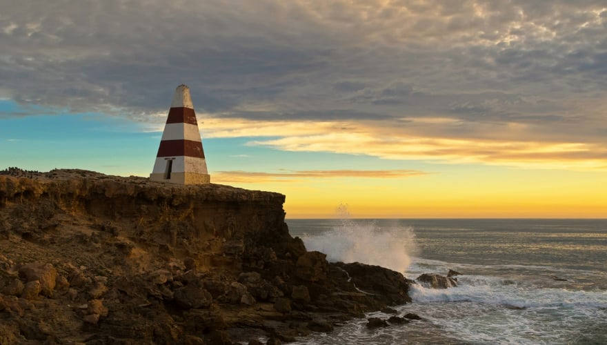 Obelisk, historic landmark at Cape Dombey during sunset, Robe, South Australia